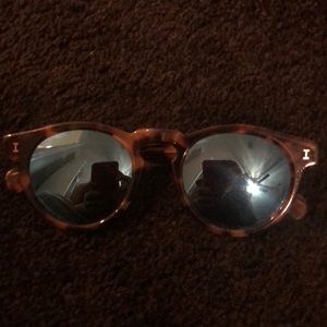 Illesteva sunglasses with blue lenses